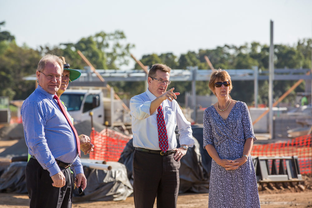 Luke Reed (second from right) MacKillop Catholic College Principal, discusses Secondary School expansion plans with Dr Lee-Ann Perry (right), Executive Director of Queensland Catholic Education Commission, Bill Dixon (left) Executive Director of Cairns Catholic Education Services and Warren Kelly (second from left - obscured) project Construction Manager of Osbourne Construction Solutions.